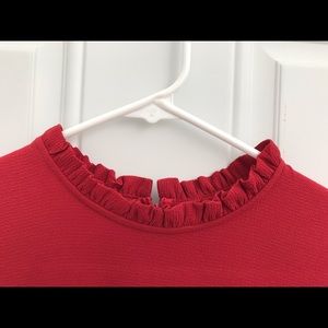 Red dress with ruffled accents